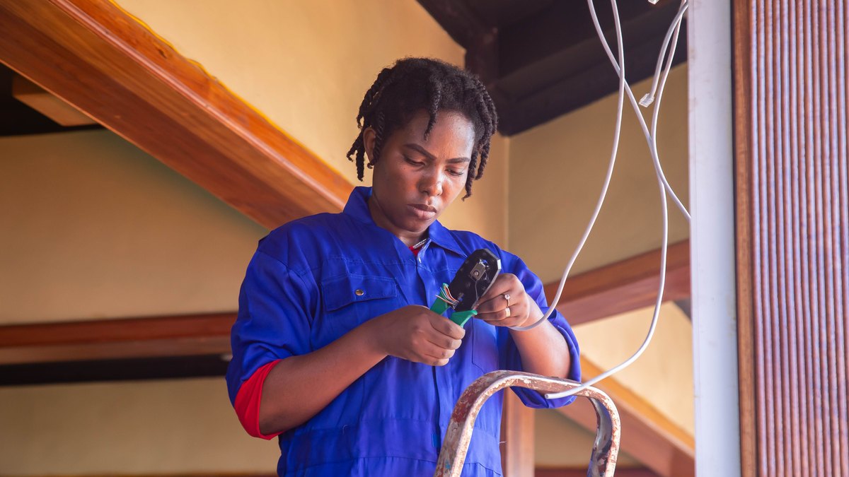 An electrician working on home wiring