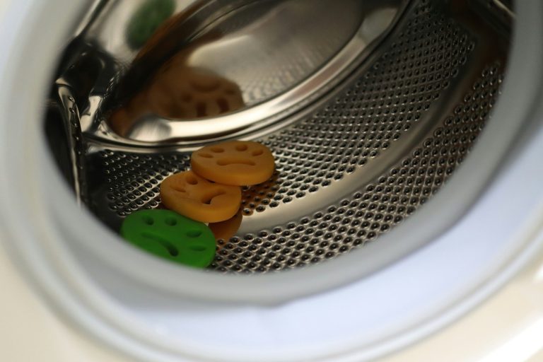 a close up of a dryer with buttons in it