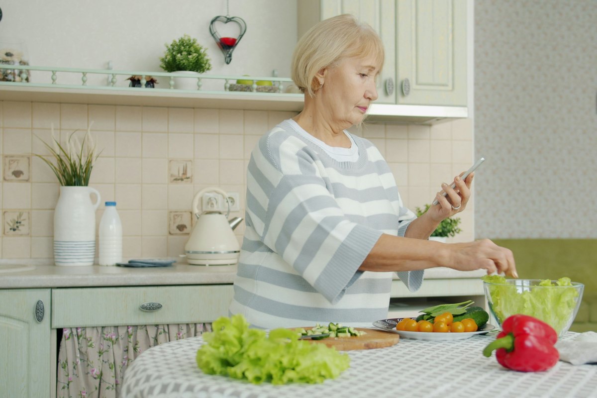 A person preparing food in a modern kitchen