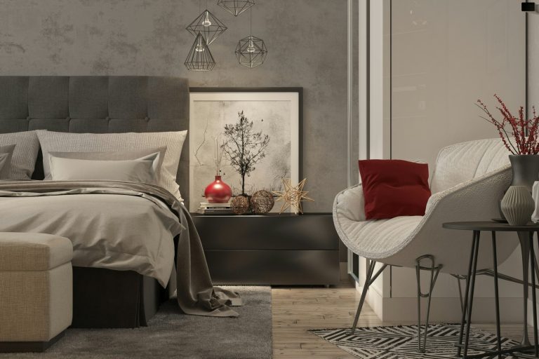 red throw pillow on white sofa