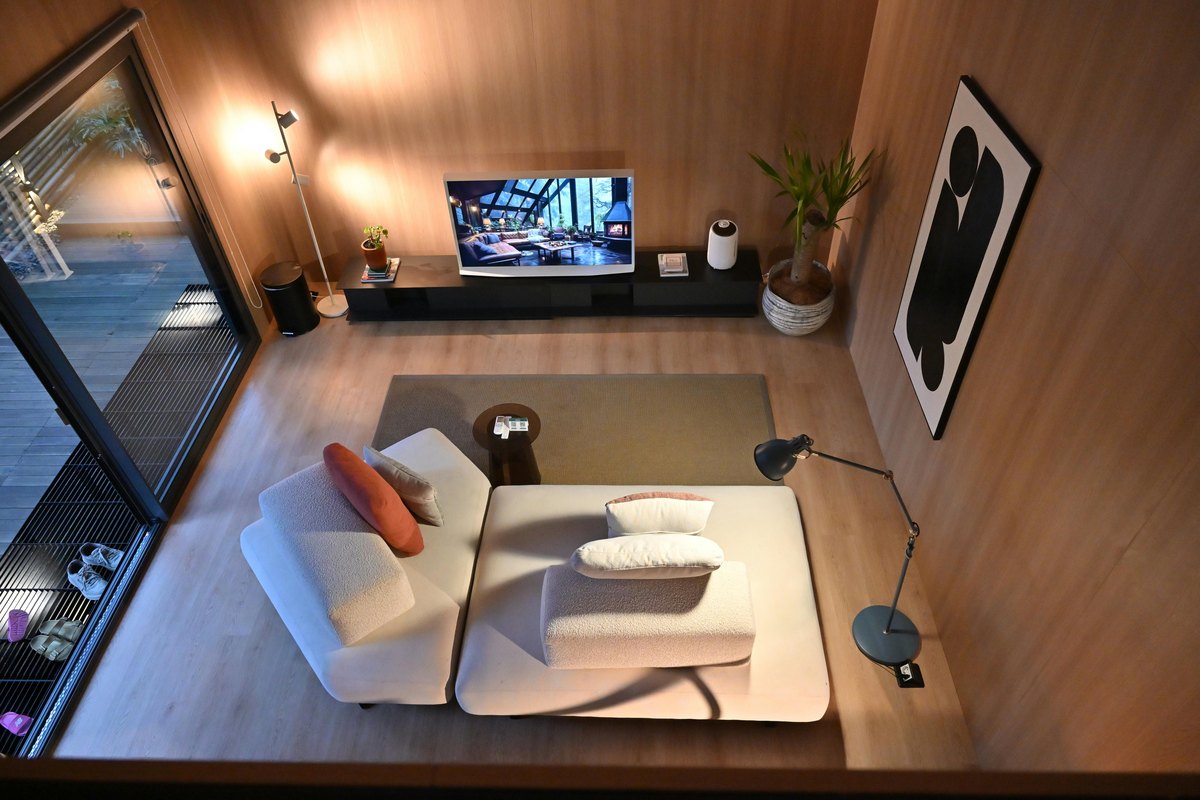 A television and media console in a living room