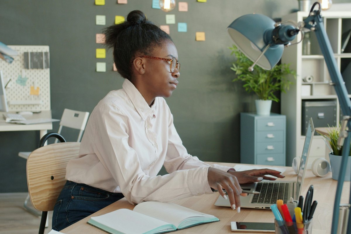 A person working at a home office desk