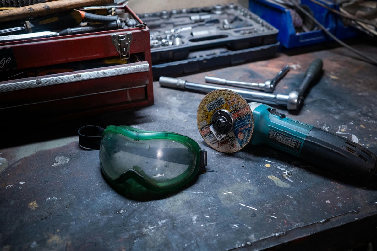 A garage workbench with power tools