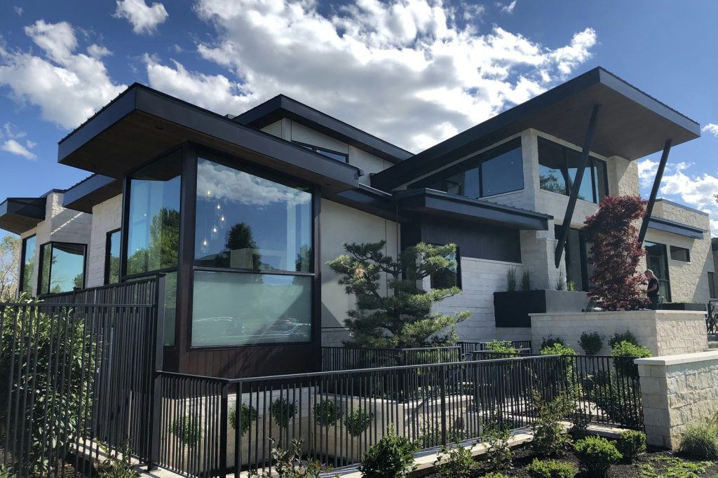 white and brown wooden house under blue sky during daytime