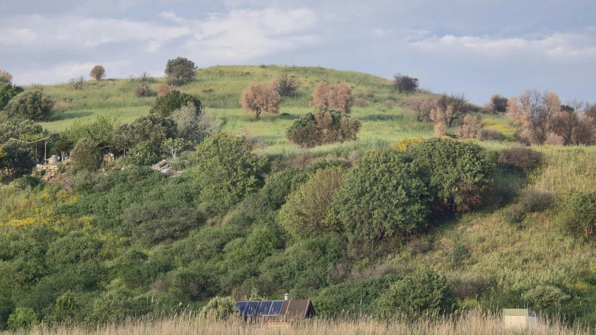 A hillside cabin running on solar panels